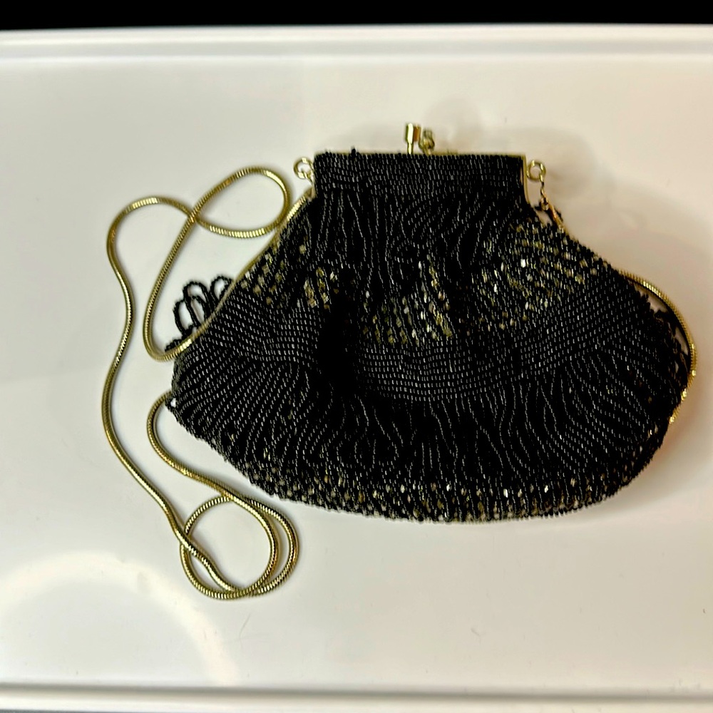 Black beaded hand bag with metal strap